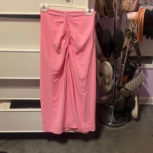Pink ruched midi skirt with slit